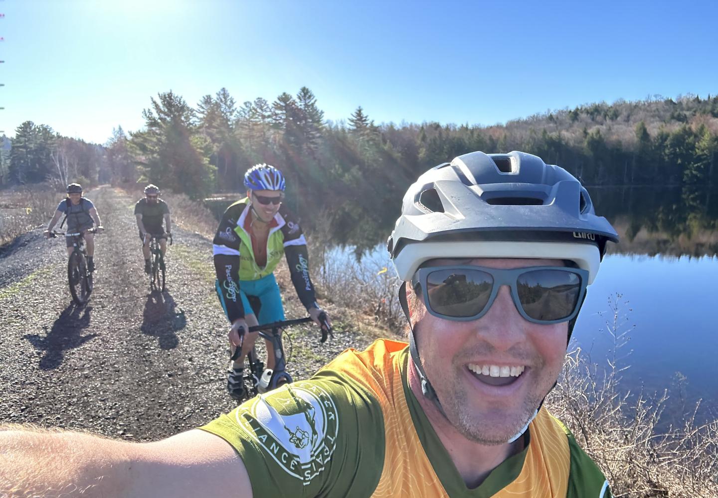 A group of riders enjoys the section between Saranac Lake and Lake Clear.