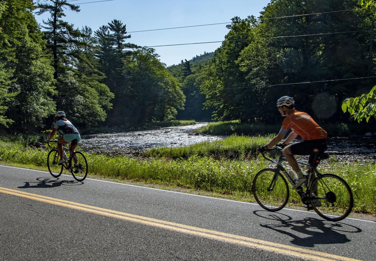 Riders cruise along the Ausable River outside of Wilmington on a quite backroad heading towards Clayburg.