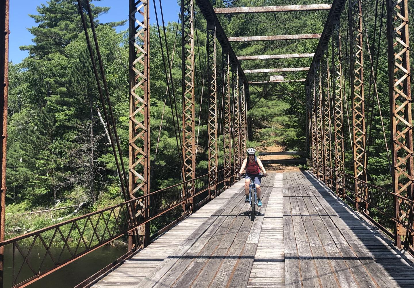 A cyclist explores a gravel route near Loon Lake, New York.