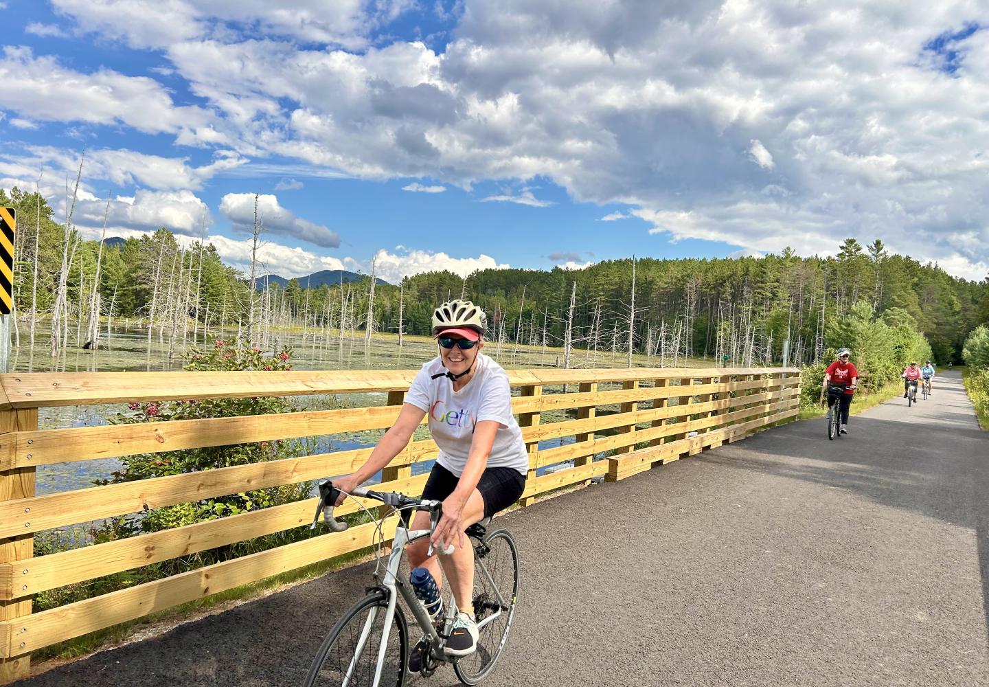 A cyclist enjoys the Adirondack Rail Trail.