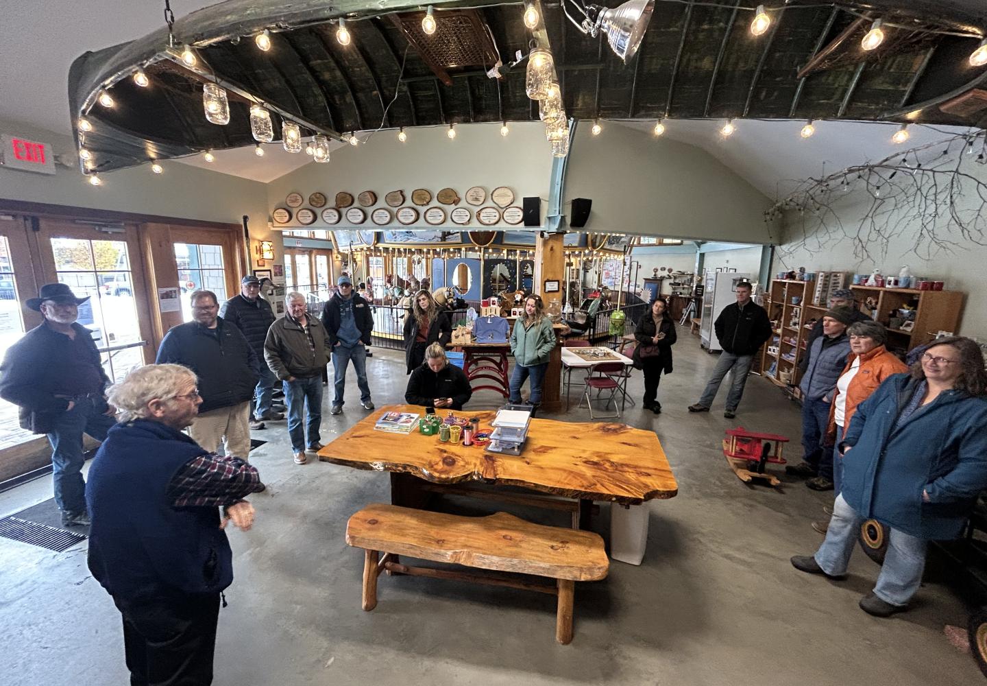 Members of the Lewis County Legislature visit the Adirondack Carousel during a site visit to the Adirondack Rail Trail