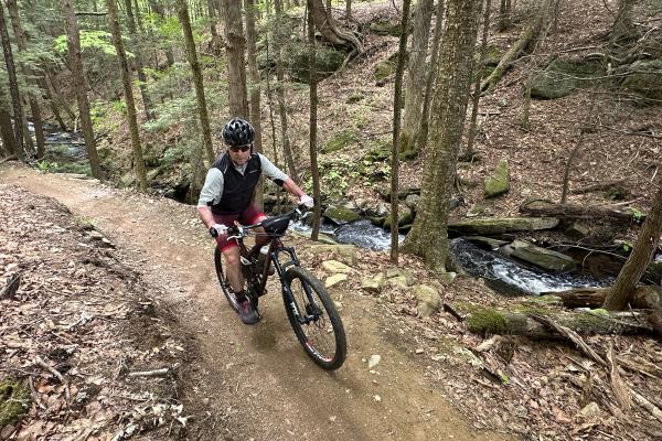 Tim Peartree explores the Graphite Range Community Forest on his mountain bike.