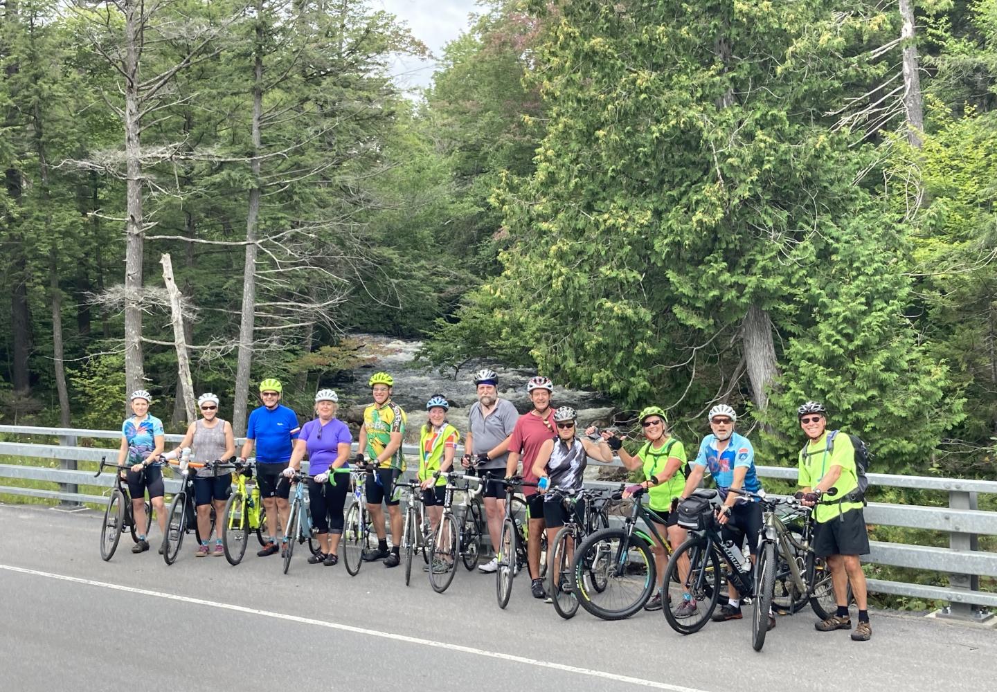 Time to get the group shot in front of Big Moose Lake Outlet.