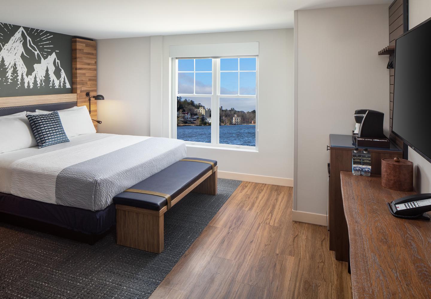 A king bed room at the Saranac Waterfront Lodge