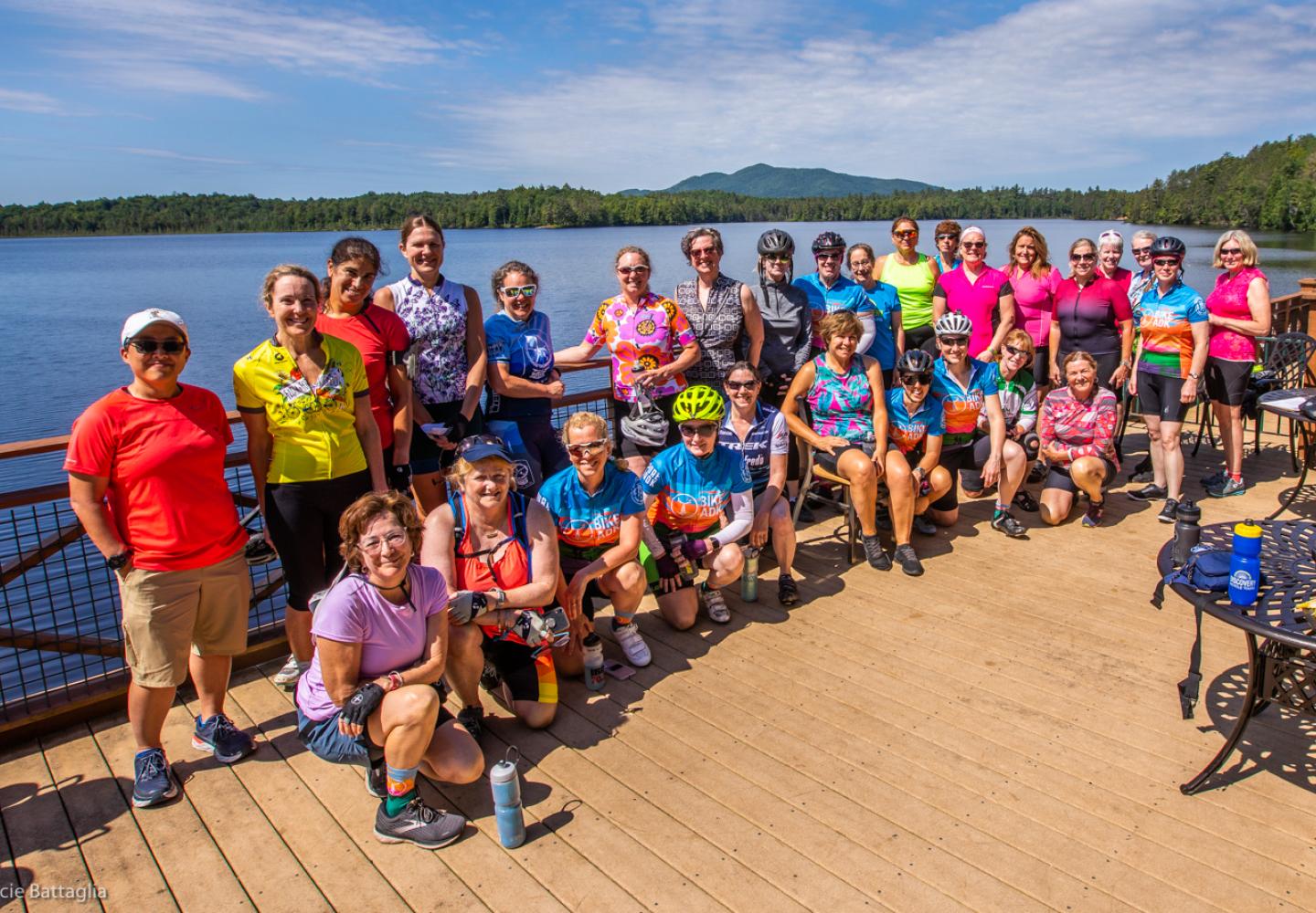 Riders gather on the deck at Paul Smith's College