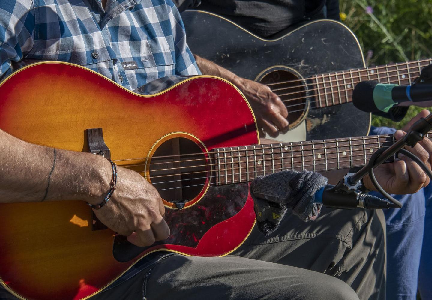 Live music by High on the Hog by the campfire closes out a perfect opening day.