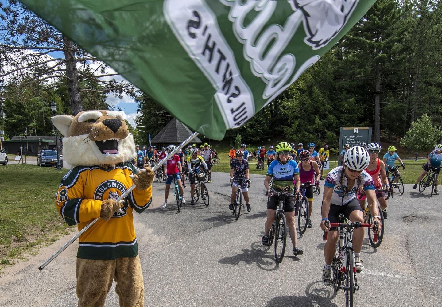 The Paul Smith's College mascot, Reggie, sends off riders on the first day of the three day event. 