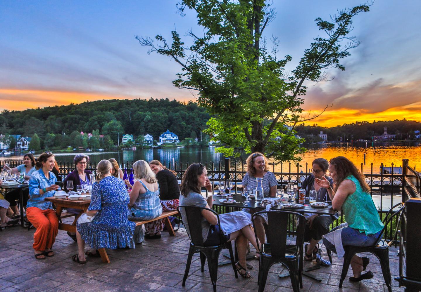 We can't help it, January (especially a rainy, not-so-snowy, January) has us thinking about summer riding and Adirondack evenings like this one when 40 amazing women gathered at the Saranac Waterfront Lodge for dinner on the patio to kick off the second annual Adirondack Women's Weekend. 