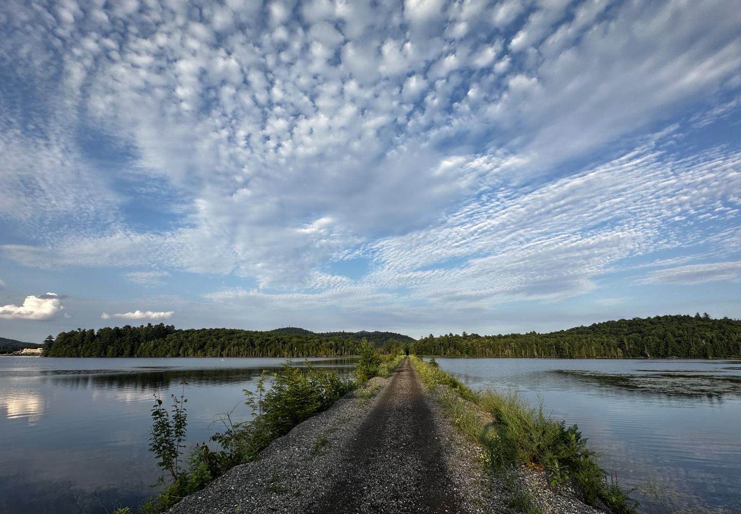  The Adirondack Rail Trail crosses Lake Colby on a causeway.