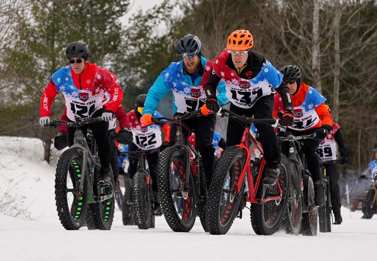 Fat bike racers compete in the Empire State Winter Games at Dewey Mountain in Saranac Lake.