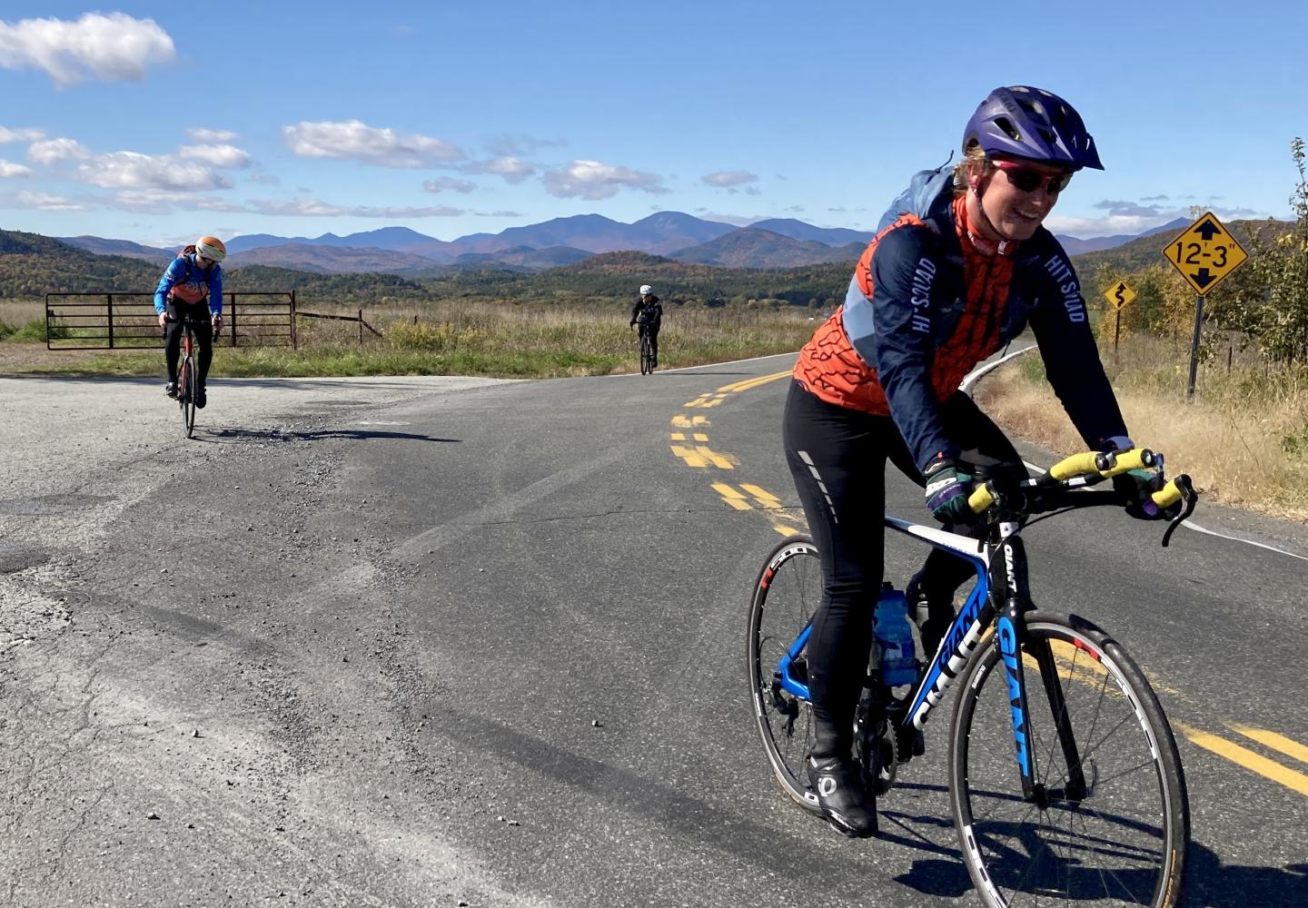 Cyclists enjoy one of the many low traffic backroads that parallel Route 22 in the Champlain Valley.