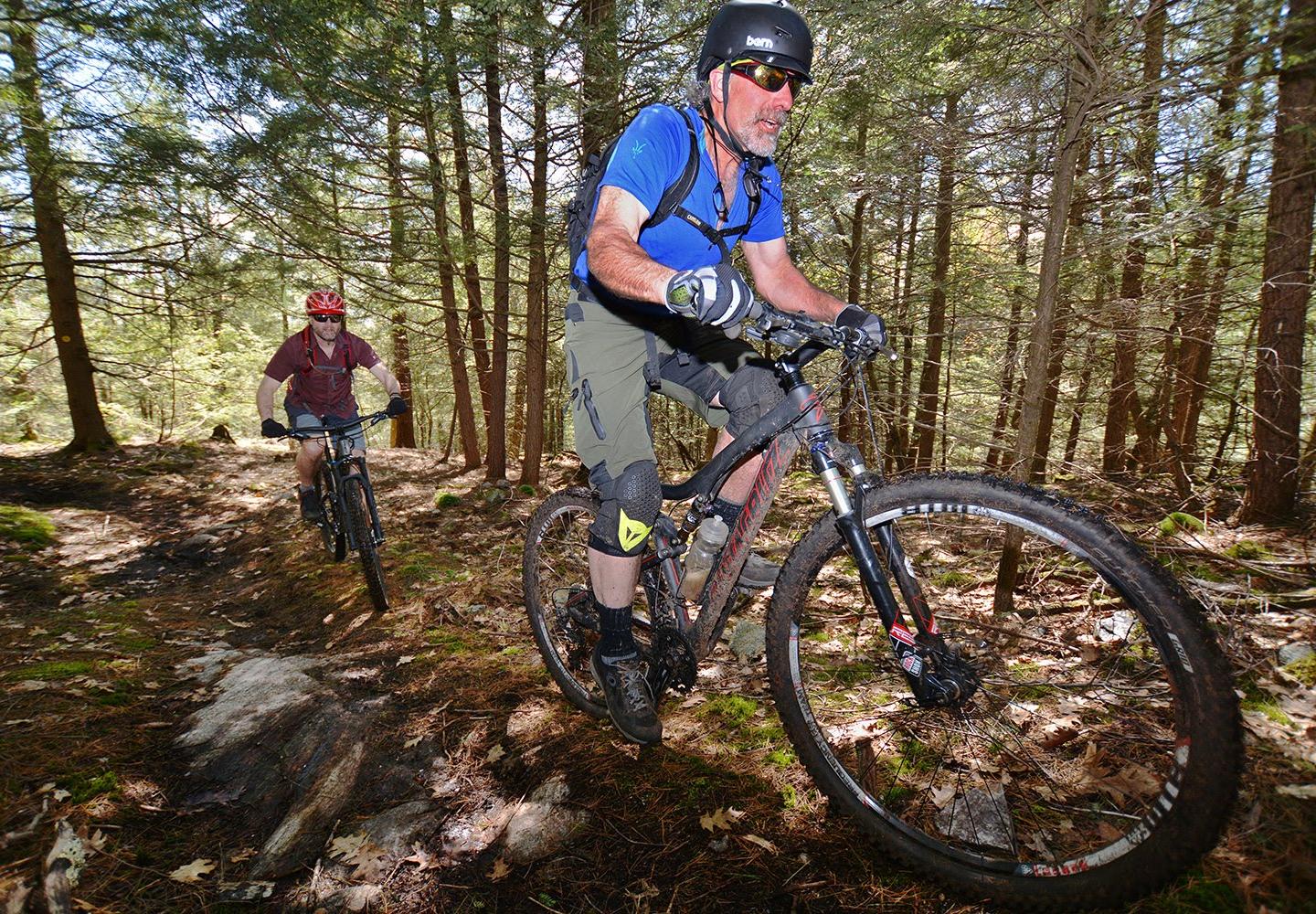 Riders climb the Stairway to Heaven and the Brant Lake Bike Park.