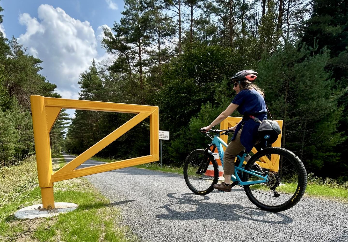 A cyclist rides on the newly opened Phase 2 section of the Adirondack Rail Trail.