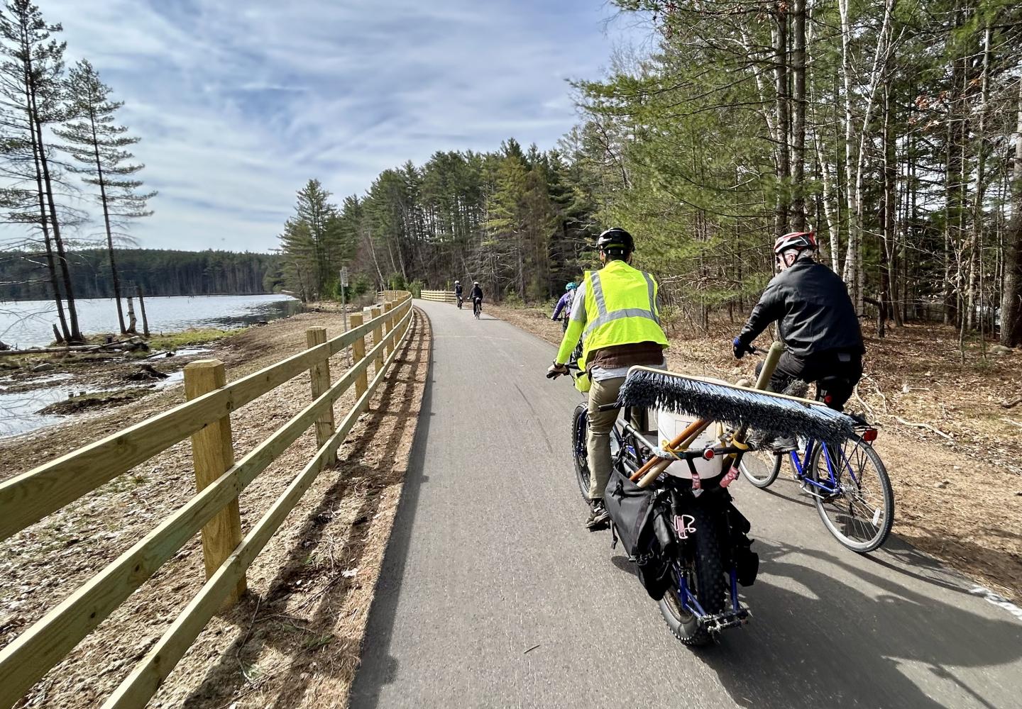 Participants in the spring Adirondack Rail Trail cleanup "shuttle" to the next spot.