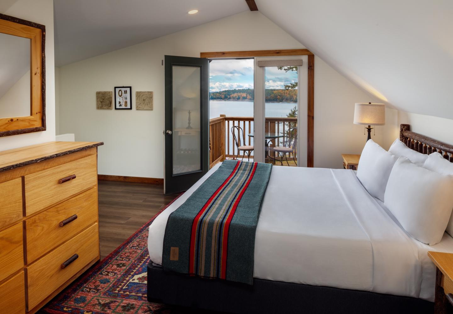 The loft bedroom in a chalet at the Lodge at Schroon Lake