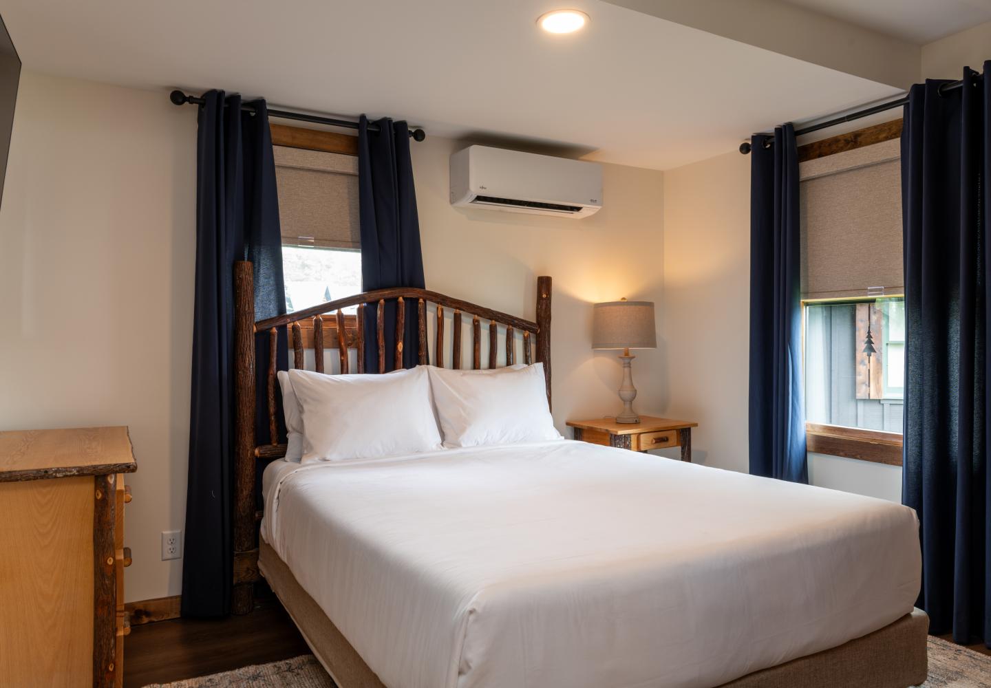 A king bedroom in a chalet at the Lodge at Schroon Lake