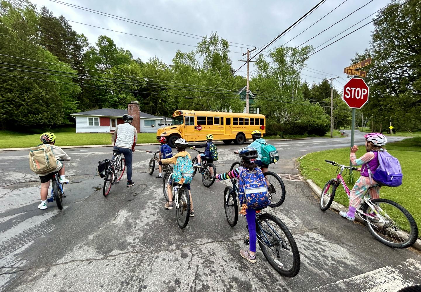 A group of students participate in a Bike Bus to safely ride to school.