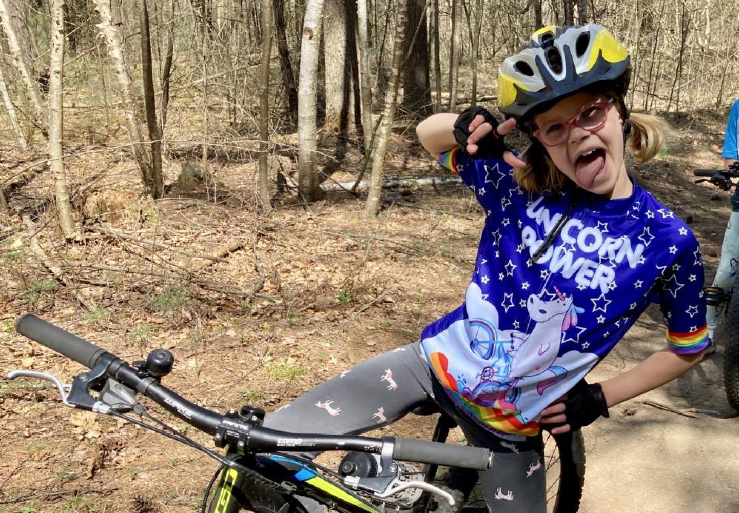 A young bicyclist enjoys a mountain biking trail in New York state.