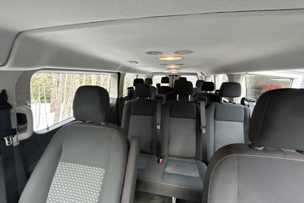 Our spacious air-conditioned interior has usb charging ports in each row. 