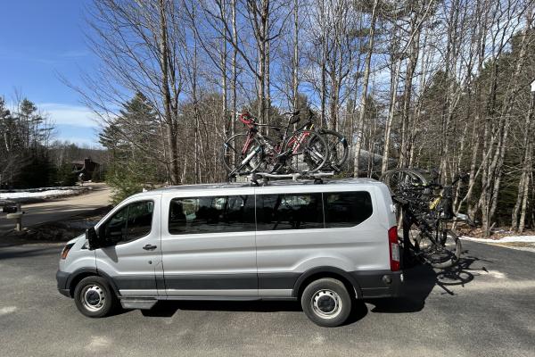 BikeADK's Rail Trail Shuttle Van can accommodate up to ten passengers and ten bikes