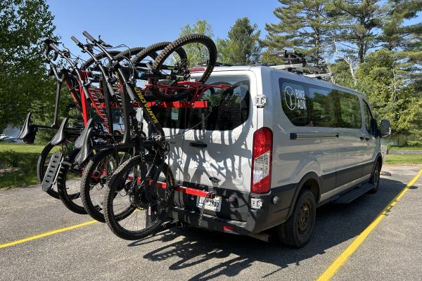 Our shuttle van can accommodate up to 10 guests and 10 bikes.